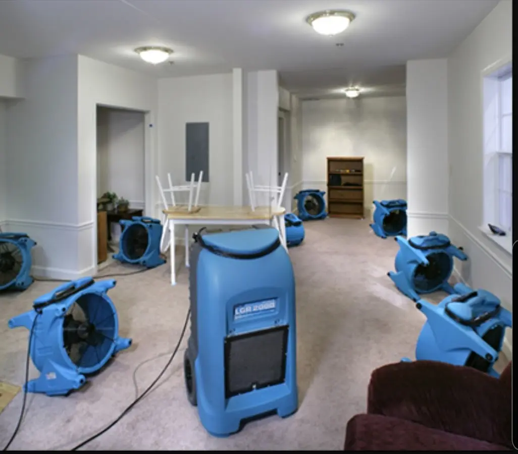 Air movers and dehumidifier setup for Water Damage Restoration in Clanton